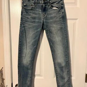 Washed blue jeans American eagle